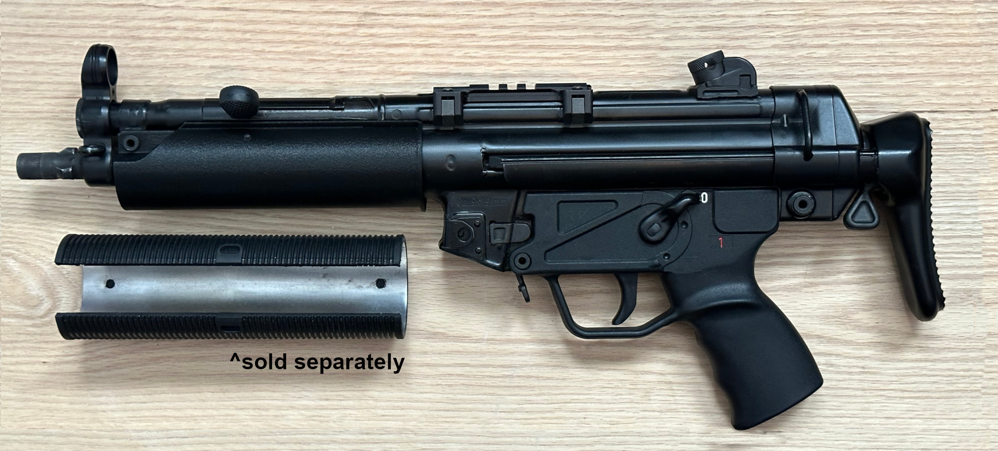 A picture of the BL-SD adapter partly installed onto an MP5.