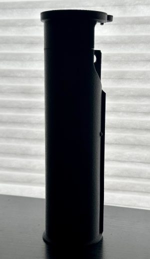 A picture of the BL-SD Handguard Adapter sitting vertically on the table.