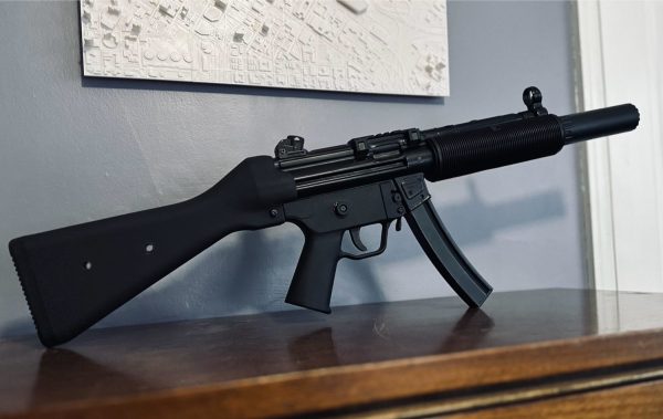 A fake MP5SD on a dresser.